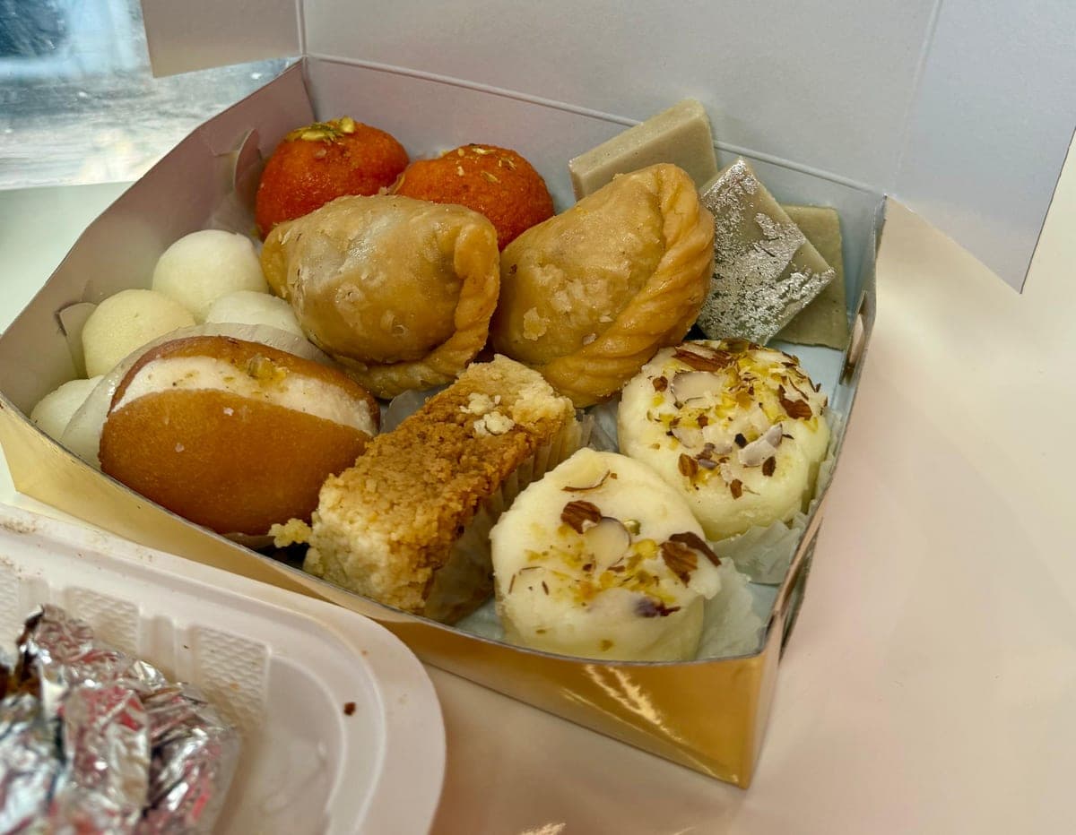 Assorted Indian sweets box — laddu, gujiya, barfi, rasgulla and kalakand at IndiaWaale